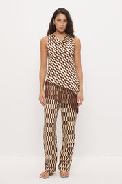 Mid-rise relaxed fit straight leg pants in brushed woven fabric with exclusive handcrafted print