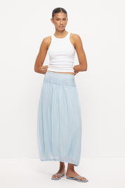 High waisted midi skirt in semi-sheer crinkle woven fabric with pinstitched waistband and tulip hem