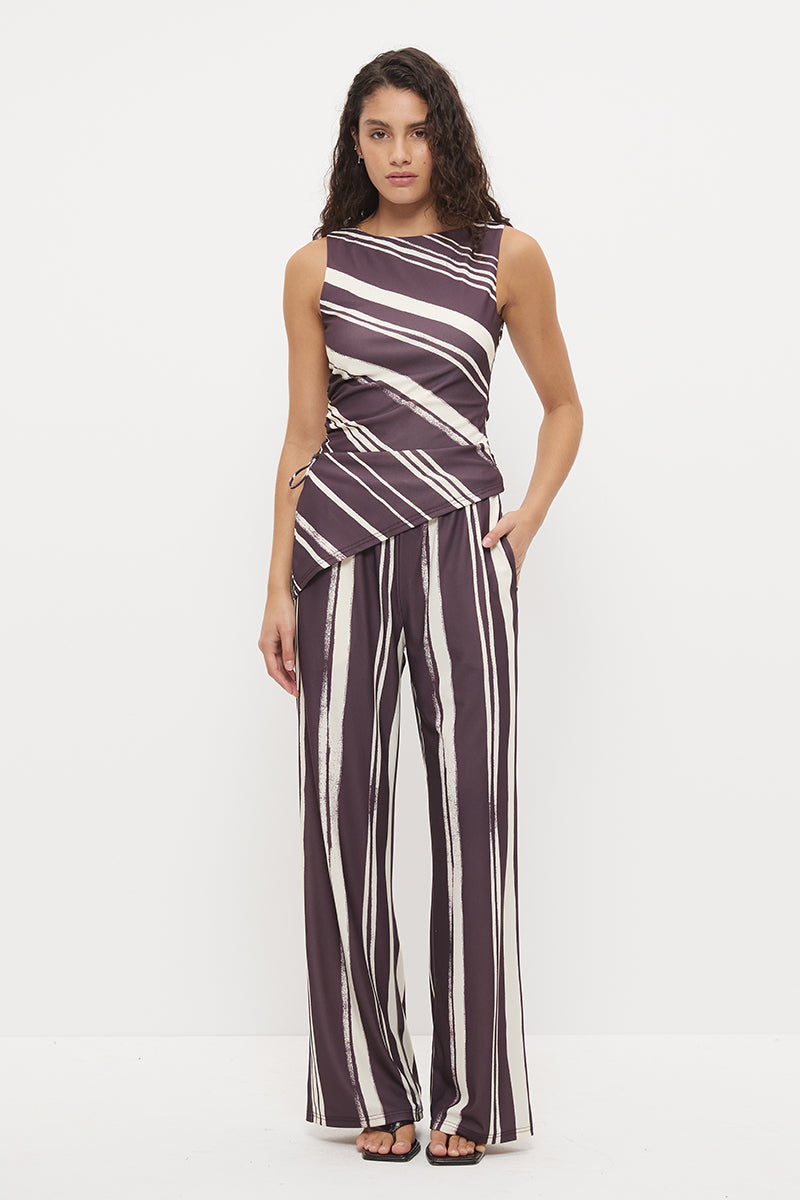 Mid-rise relaxed fit straight leg pants with drawcord waist in exclusive handcrafted print