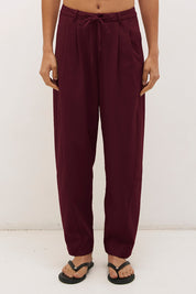 Cotton twill barrel leg pants with mid-rise fit, drawstring waist and structured panel detailing