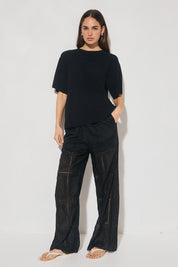 ELOWEN Relaxed Drawstring Pants in semi-sheer embroidered fabric with wide-leg silhouette, elasticated waist, drawcord, and side pockets