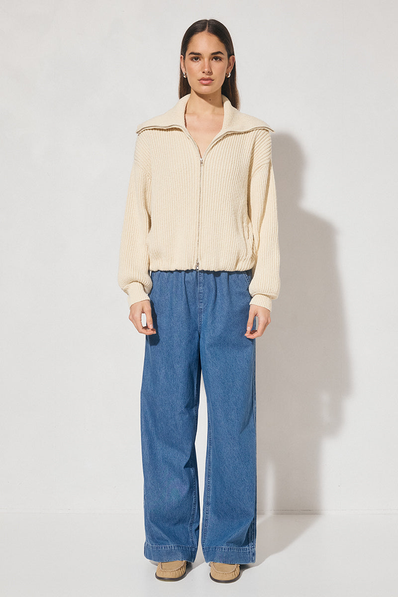 Chunky rib knit bomber jacket with wide dropped shoulders, balloon sleeves, ribbed collar and cuffs, bubble hem with internal elastic, welt pockets, and 2-way metal zipper