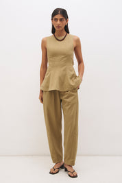 Sleeveless cotton twill top with fit and flare silhouette, open back tie detail and circle cut hem