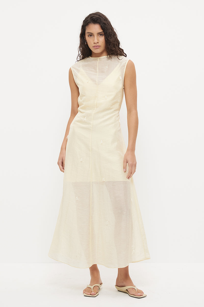 Sheer maxi dress with dropbeading embellishment and jewel neckline over separate slip