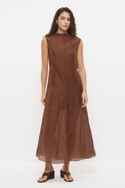 Sheer maxi dress with dropbeading embellishment and jewel neckline over separate slip