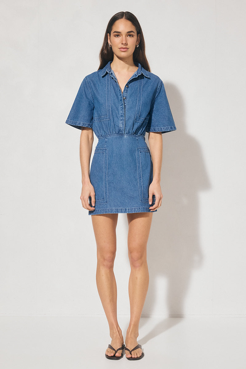 Short-sleeved denim mini dress with cornelli piping, blouson shirt-style bodice, gathered waist, and skimming mini skirt