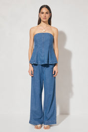 Strapless denim fit-and-flare top with cornelli piping, princess seams, flared circle-cut hem, and centre-back zipper
