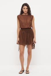Sleeveless mini dress in sheer woven fabric with blouson bodice and tasseled scarf belt