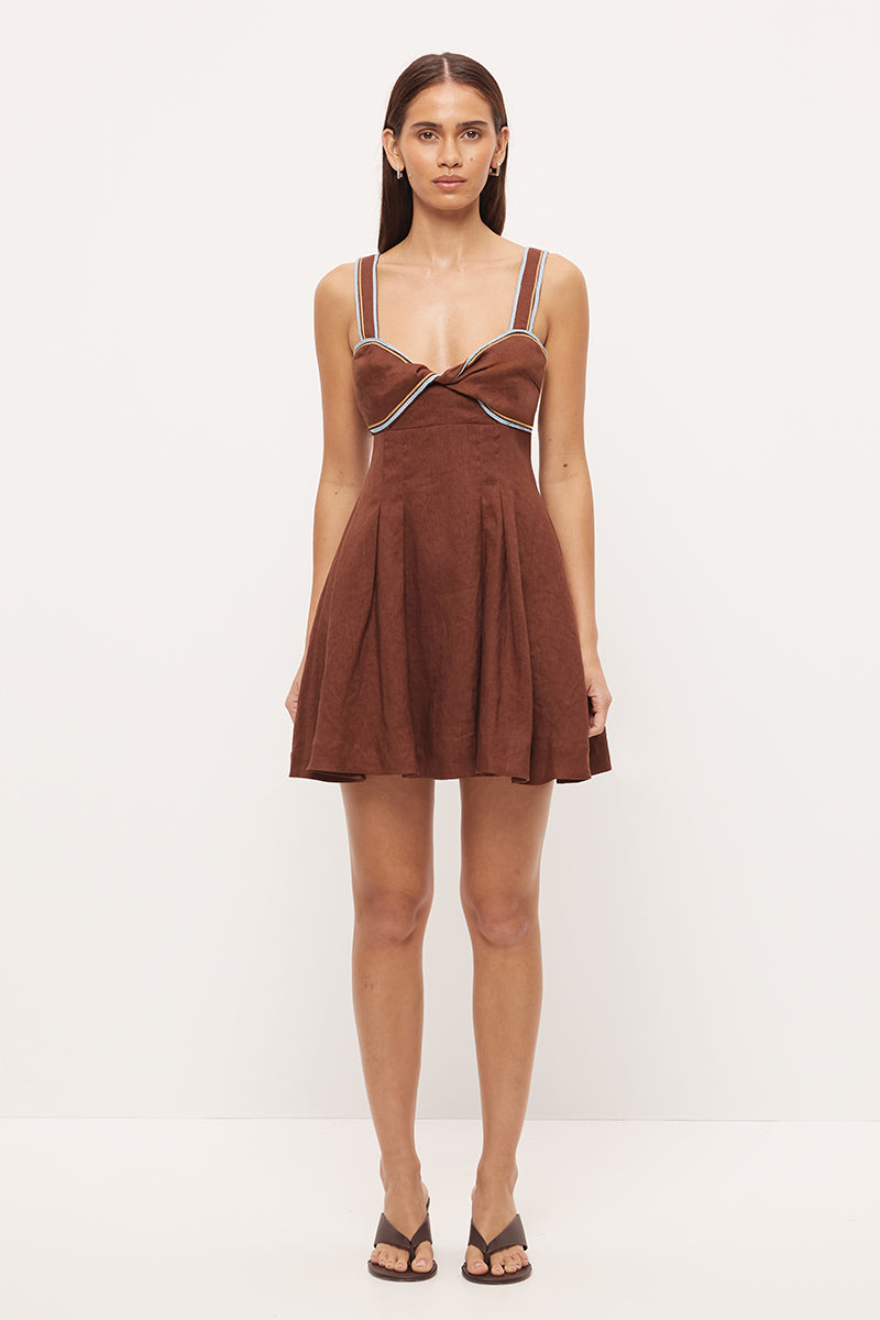 Twist front linen mini dress with sweetheart neckline, empire line fit and contrast cornelli applique