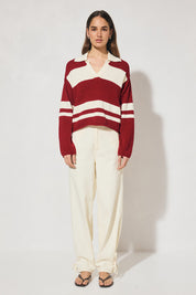 Bicolour collared knit jumper with oversized fit, dropped shoulder, V neckline, contrast polo-style collar and placket, long sleeves, and narrow rib hem finishes