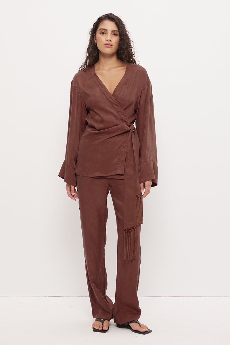 Mid-rise relaxed fit straight leg pants in brushed woven fabric with exclusive handcrafted print