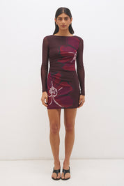 Long sleeve mesh mini dress with handcrafted placement print, boat neckline, sheer sleeves and fitted silhouette
