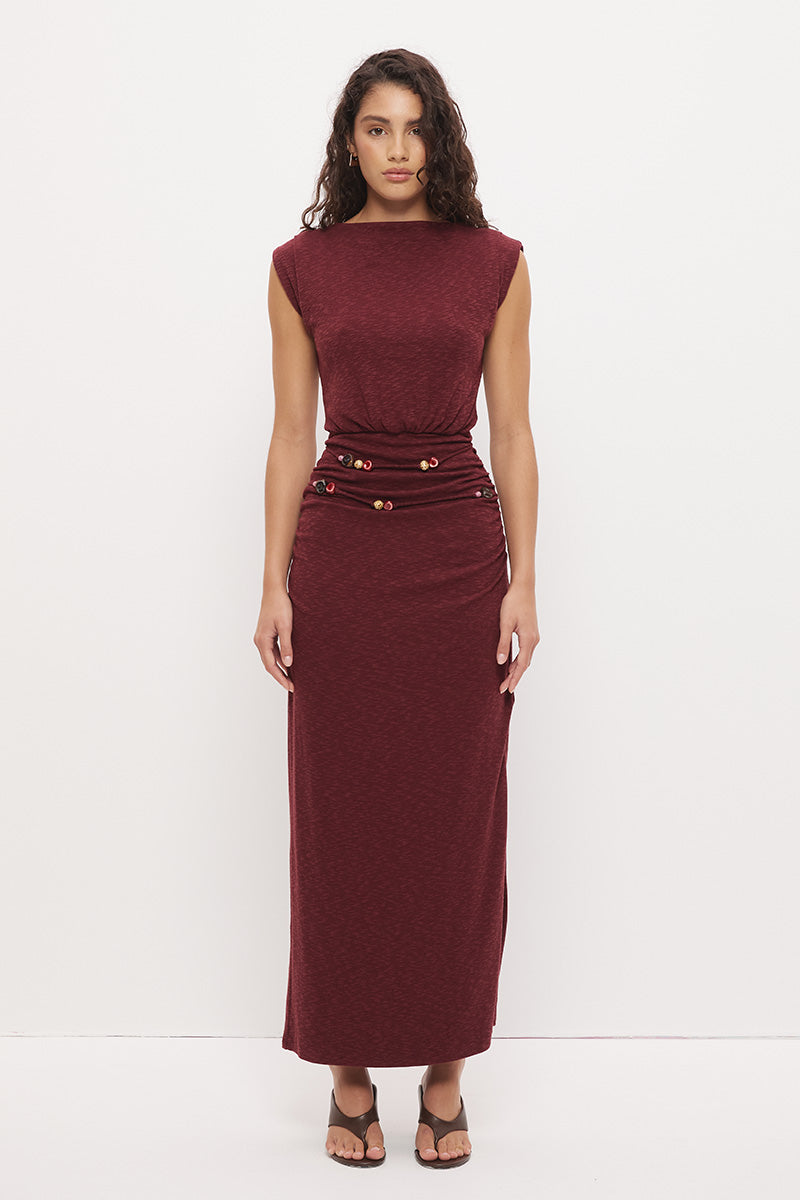 Sleeveless textured jersey column midi dress with boat neckline, beaded asymmetrical straps, hip ruching, and side split