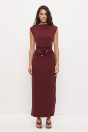 Sleeveless textured jersey column midi dress with boat neckline, beaded asymmetrical straps, hip ruching, and side split