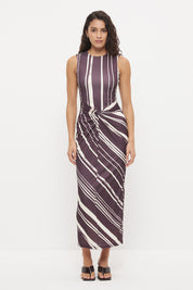 Sleeveless midi dress with fitted column silhouette, twisted knot detail and cascading ruching in exclusive handcrafted print