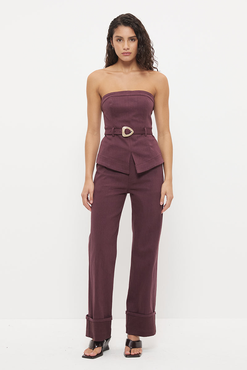 Strapless stretch denim top with tailored bodice, princess seams and contrast buckle belt