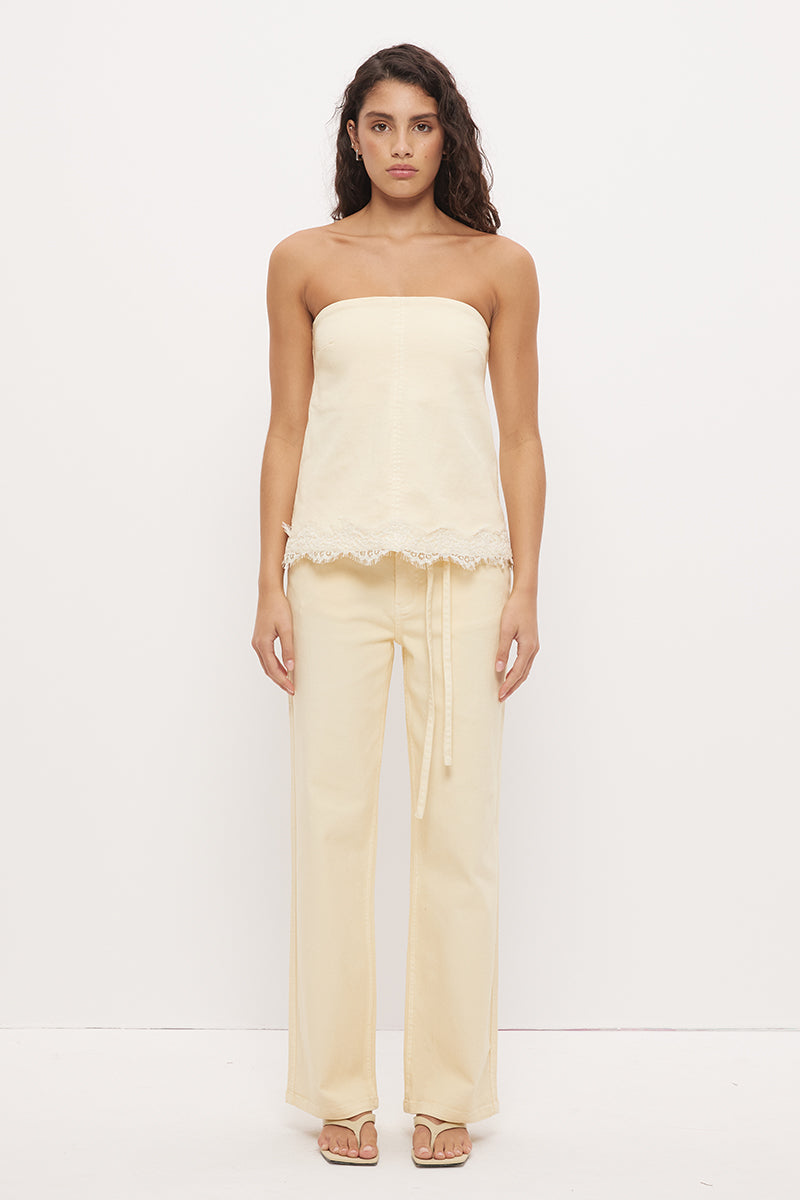 Strapless denim top with A-line silhouette and scallop lace trim hemline