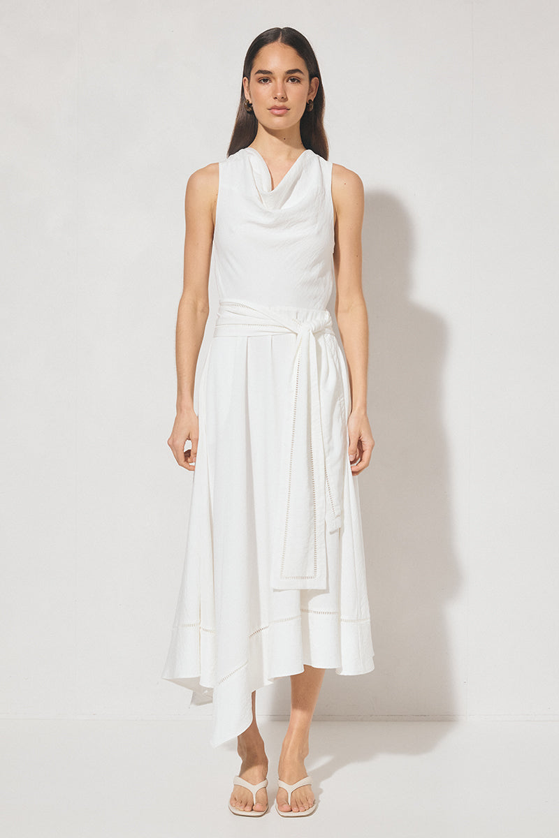 Sleeveless textured woven fit and flare midi dress with cowled neckline, ladder trim hem, handkerchief skirt, and waist sash
