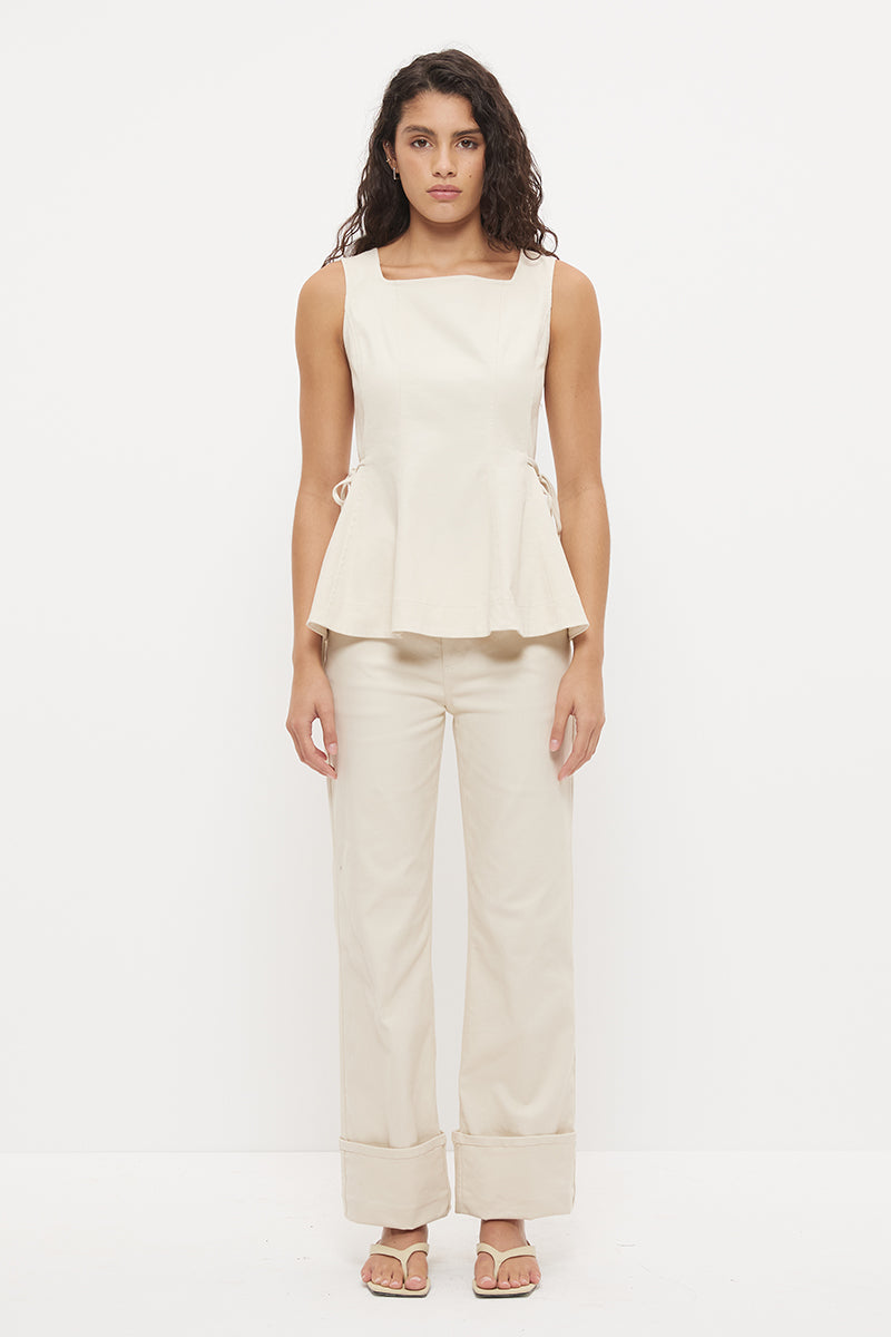 Sleeveless denim top with fit and flare silhouette, square neckline and circle cut flared hemline