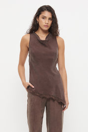 Sleeveless longline bias top with cowl neckline, scalloped lace hem and asymmetrical hem in silky cupro blend fabric