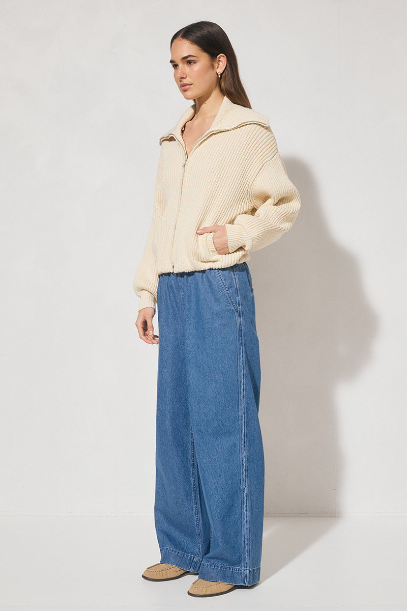 Chunky rib knit bomber jacket with wide dropped shoulders, balloon sleeves, ribbed collar and cuffs, bubble hem with internal elastic, welt pockets, and 2-way metal zipper