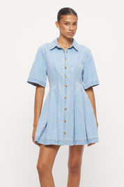 Light wash denim shirt mini dress with fit and flare silhouette, inverted pleats and contrast topstitching