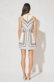 Sleeveless mini dress with handcrafted placement print, blouson bias-cut bodice, cowled neckline, and skimming mini skirt