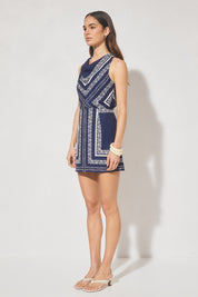 Sleeveless mini dress with handcrafted placement print, blouson bias-cut bodice, cowled neckline, and skimming mini skirt