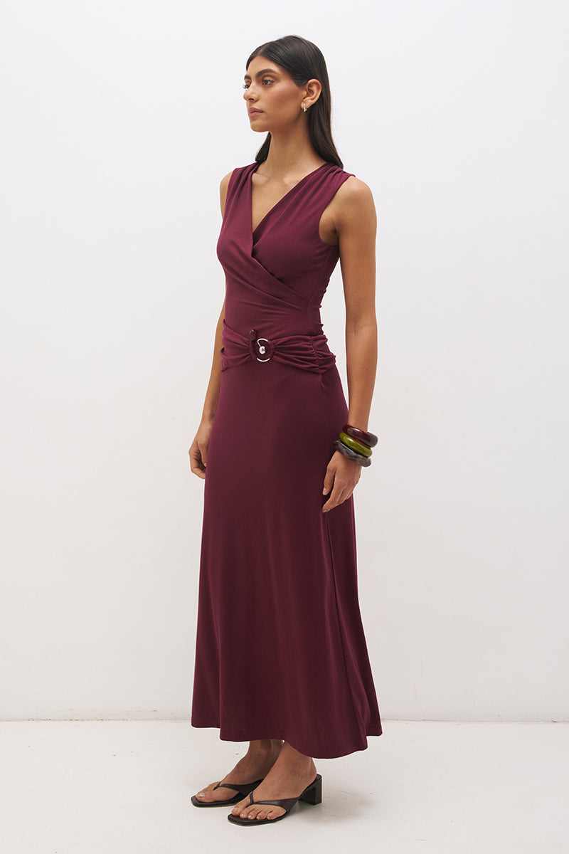 Sleeveless jersey maxi dress with cowl neckline, spiral ring detail, ruched bodice and fit and flare silhouette