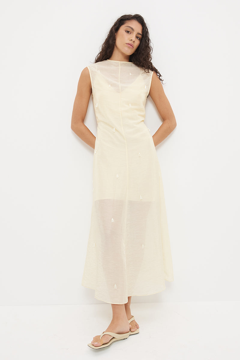 Sheer maxi dress with dropbeading embellishment and jewel neckline over separate slip