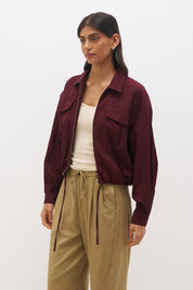 Cotton twill bomber jacket with balloon sleeves, patch pockets, drawcord hem and relaxed fit silhouette