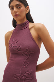 Knitted halter neck maxi dress with floral appliqué, turtleneck band, bodycon bodice and fit and flare skirt