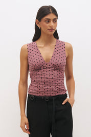 Rosewood and black sleeveless flocked polka dot mesh midi dress with plunging V-neckline, empire seam and A-line skirt
