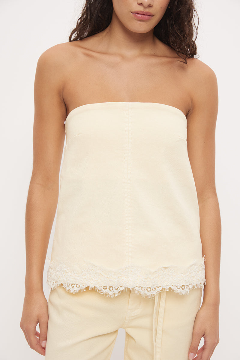 Strapless denim top with A-line silhouette and scallop lace trim hemline