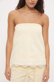 Strapless denim top with A-line silhouette and scallop lace trim hemline
