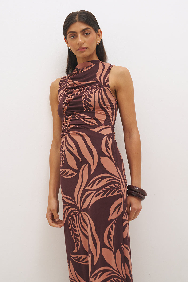 Sleeveless printed midi dress with fit and flare silhouette, funnel neckline, ruched bodice, and soft A-line skirt in stretch modal jersey
