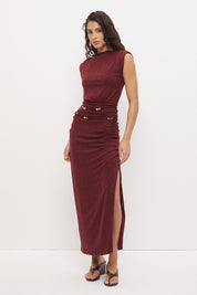 Sleeveless textured jersey column midi dress with boat neckline, beaded asymmetrical straps, hip ruching, and side split