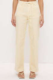 Mid-rise straight leg denim jeans with narrow waist tie and rivet detailing