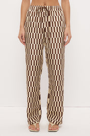 Mid-rise relaxed fit straight leg pants in brushed woven fabric with exclusive handcrafted print