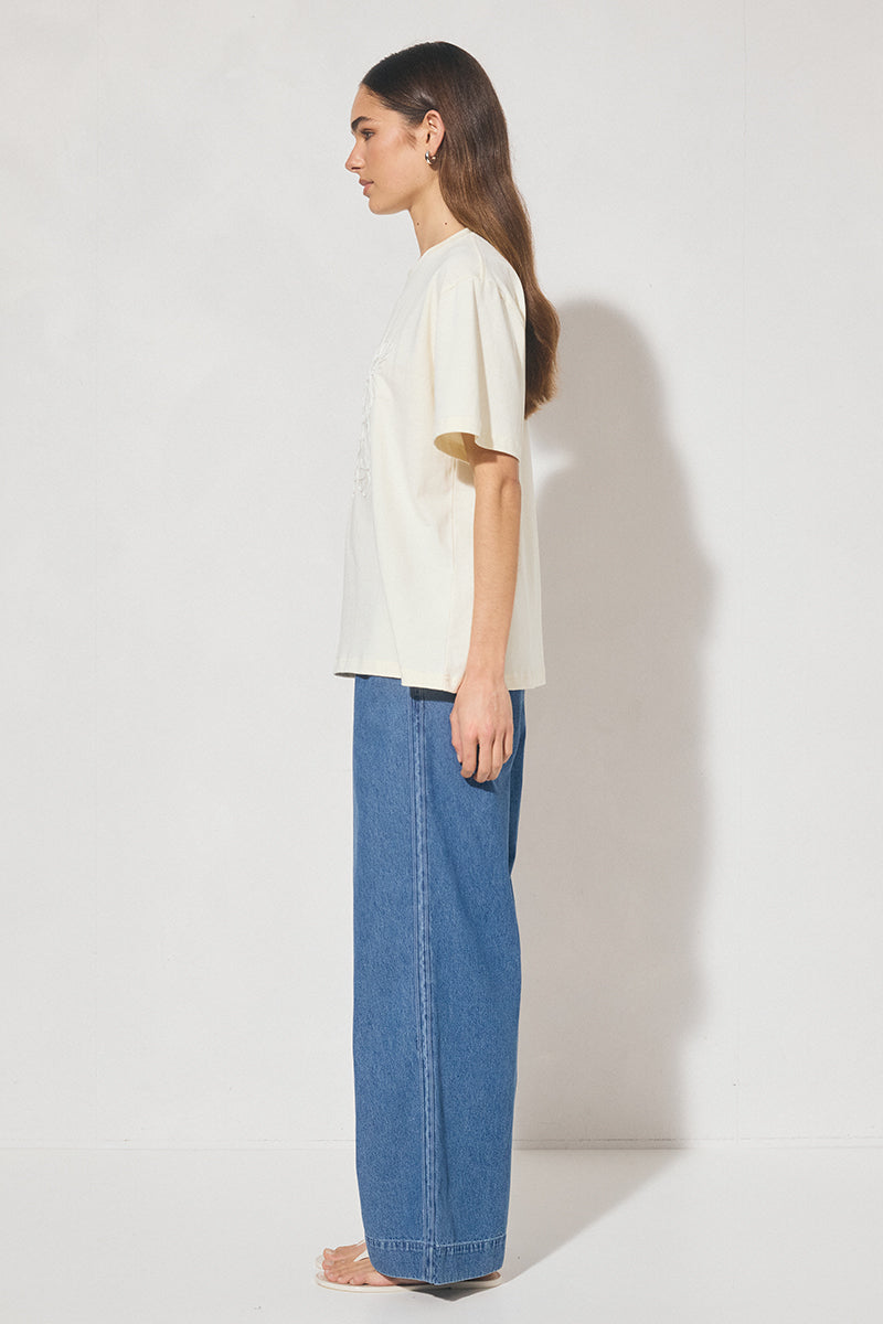  Oversized cotton jersey T-shirt with round neckline and cornelli appliqué detail, designed in Australia