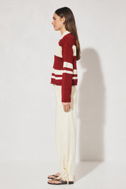 Bicolour collared knit jumper with oversized fit, dropped shoulder, V neckline, contrast polo-style collar and placket, long sleeves, and narrow rib hem finishes