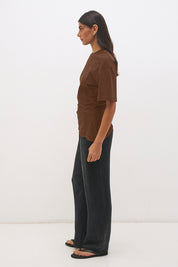 Cotton jersey tee with cinched waist, angled tuck detail, side splits and lace trim hem