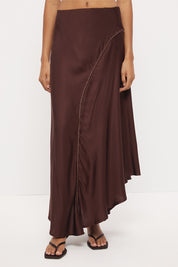Mid-rise sateen maxi skirt with bias cut, scalloped waist trim and asymmetrical draped hem
