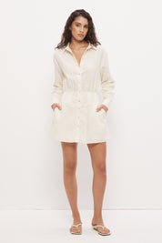 Mini shirt dress in linen seersucker with blouson bodice, cinched waist and scalloped lace hem