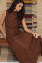 Sheer maxi dress with dropbeading embellishment and jewel neckline over separate slip