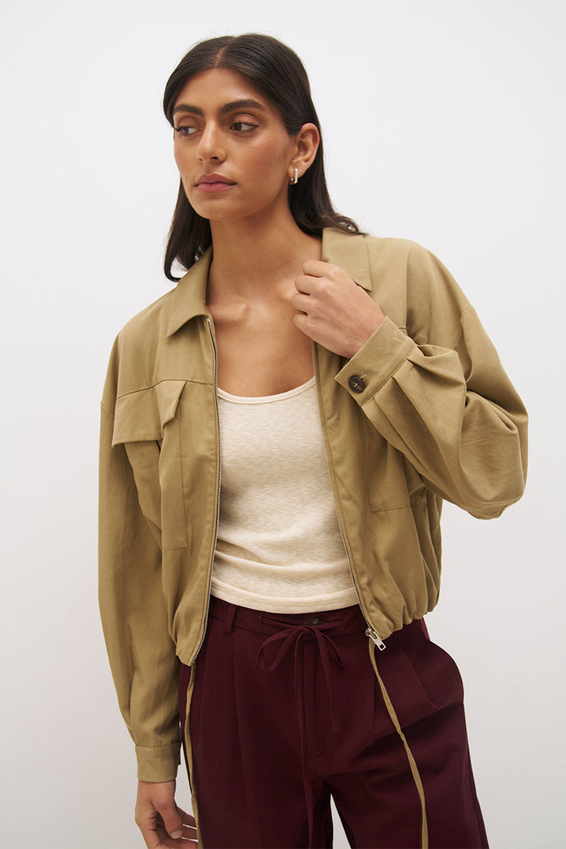 Cotton twill bomber jacket with balloon sleeves, patch pockets, drawcord hem and relaxed fit silhouette