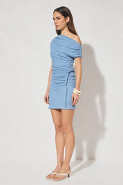 One-shoulder textured jersey mini dress with skimming fit, multi-wear draped neckline, gathered capped sleeve, cascading gathers, contrast frill hip panel, and figure-hugging mini skirt