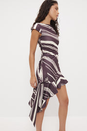 Cap sleeve mini dress with boat neckline, waist ruching and layered flounce hem in exclusive handcrafted print