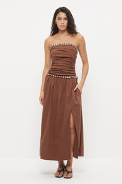 Strapless maxi dress in textured stretch cotton with two-tone fringed trim detail