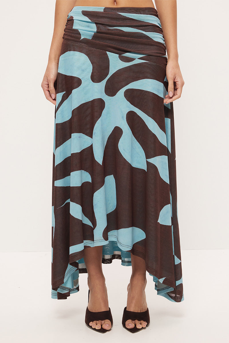 Mid-rise circle cut midi skirt in stretch mesh with asymmetrical gathered waistband and hi-lo hem in exclusive handcrafted print